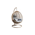 **Chaise suspendue en rotin avec coussins confortables**
