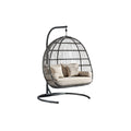 **Chaise suspendue en métal et rotin avec coussins confortables**